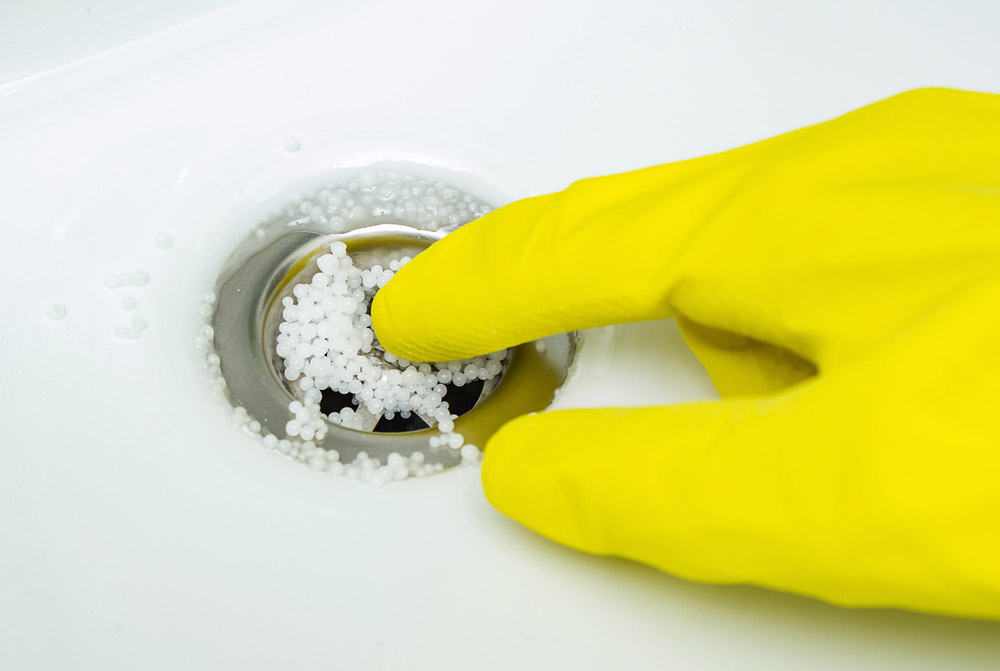 drain cleaner granules in sink